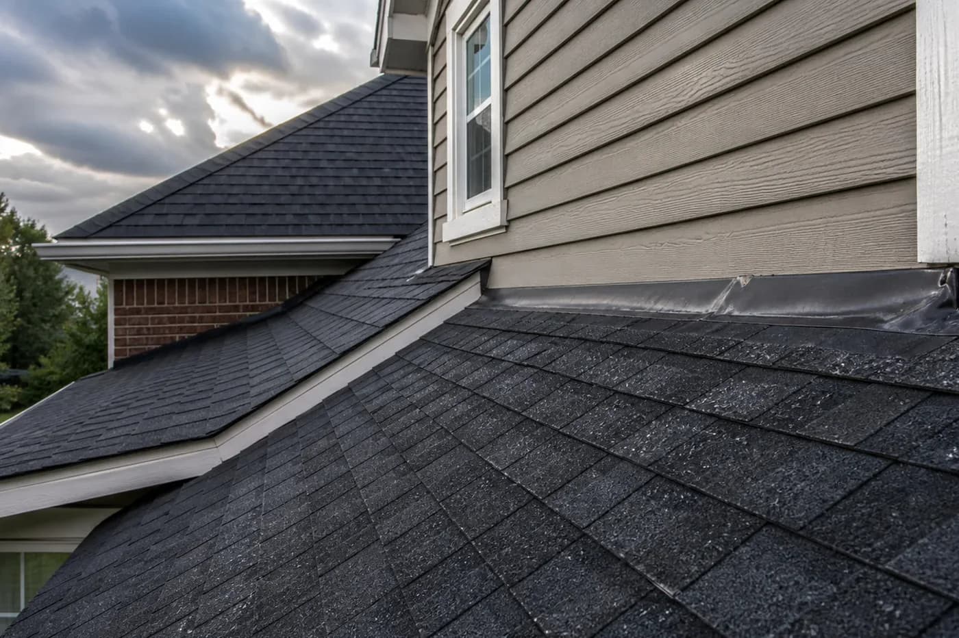 Indian Trail NC asphalt shingle roof and wall flashing after wind-driven rain where leaks can start